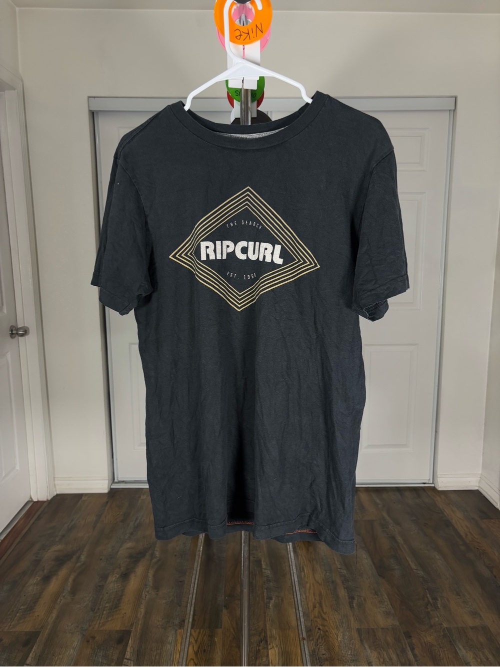 Rip Curl Black Short Sleeve Logo Tee with Gold Graphic